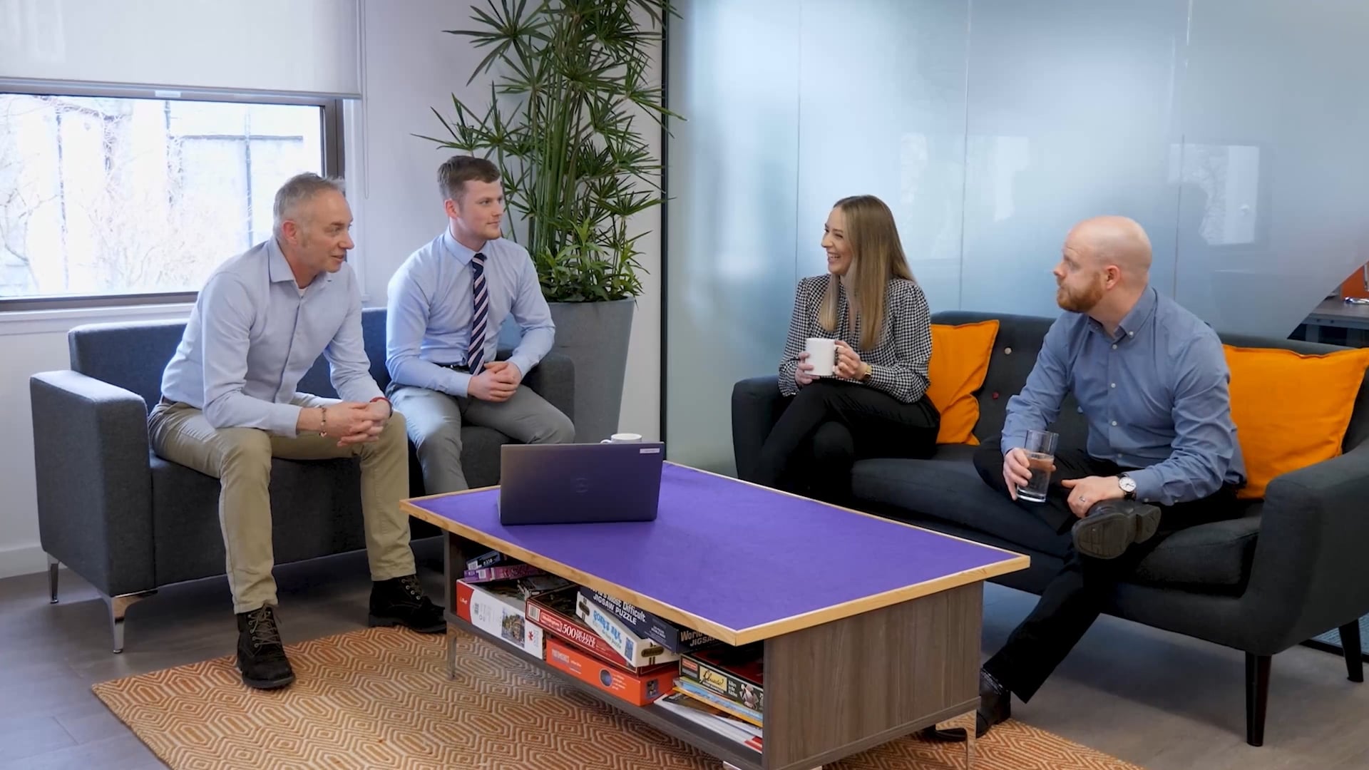 The team from Proactis Tenders Direct Video engaging in conversation.