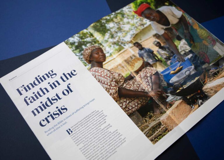 Magazine spread caption "Finding faith in the midst of crisis".