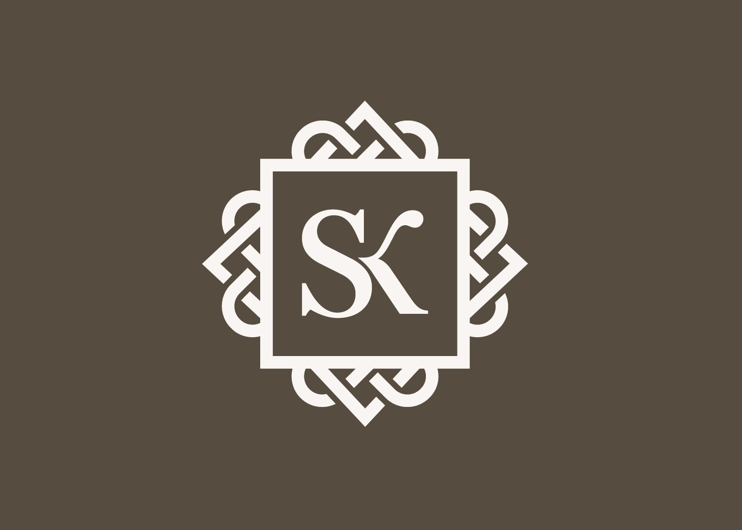 Light cream-coloured Sebastian Kobelt logo, placed on a grey-brown background.