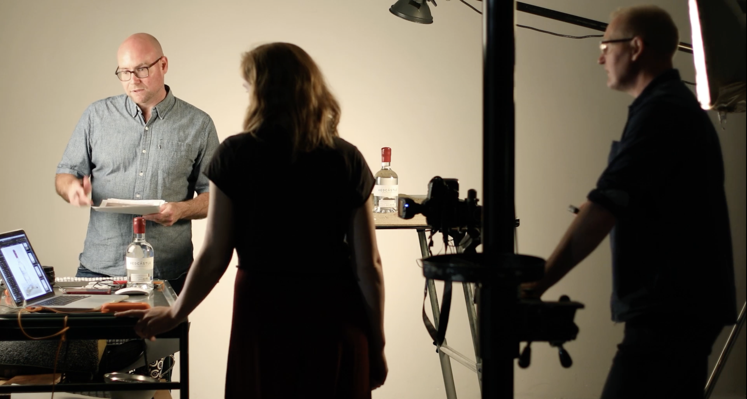 A shot of the Firefly team and a Photographer on a product photoshoot for Redcastle gin.