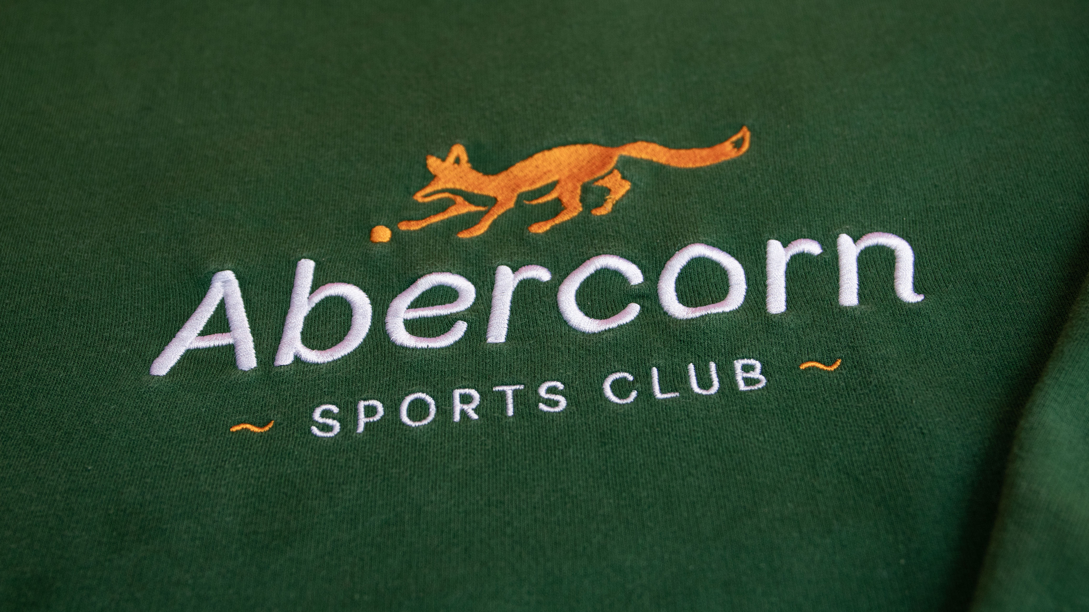 Embroidered logo design on sweatshirt